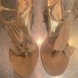 Chanel Gold/Beige Bow Sandal with 2 in heel. Pearl ankle clasps.